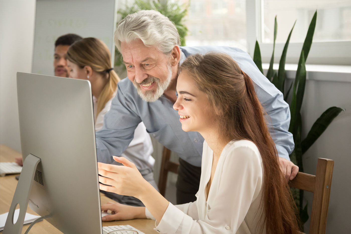 Corporate employees working together