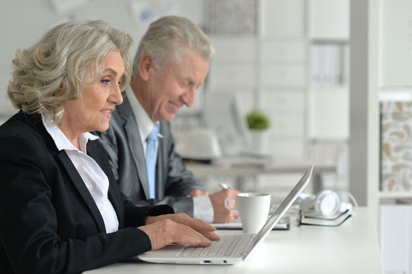 2 old corporate employees working