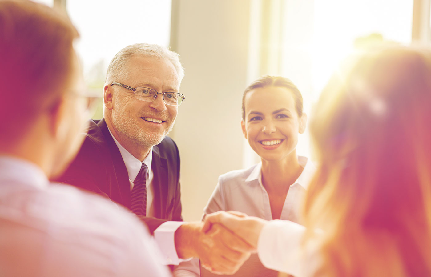 Corporate meeting and shaking hands